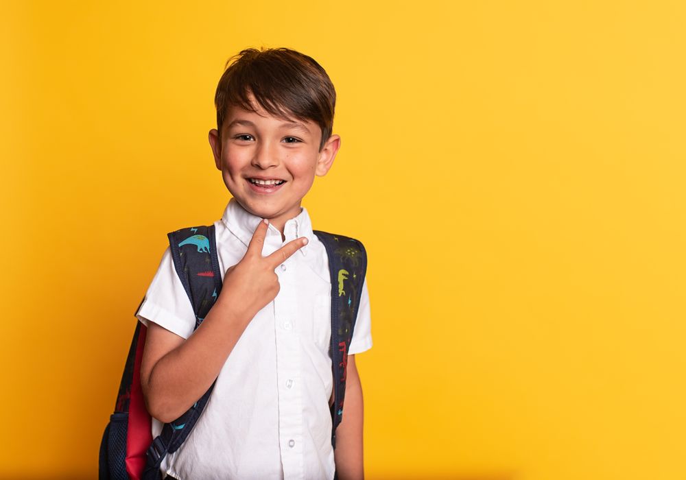 Happy kid with a backpack